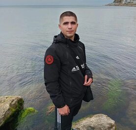 Николай